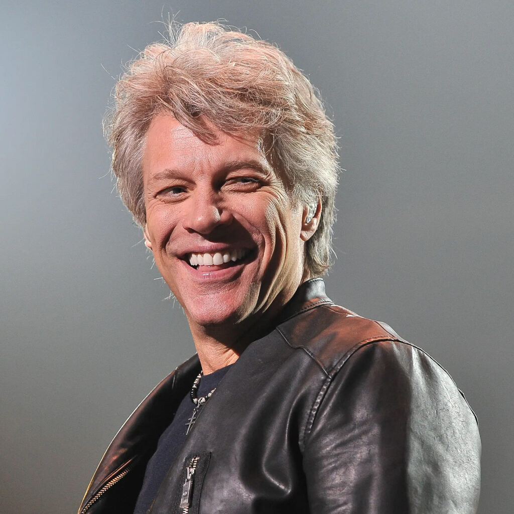 Jon Bon Jovi, smiling on stage